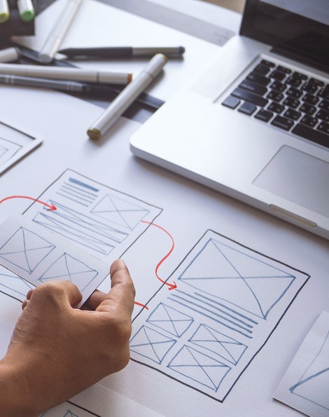 SyncShow strategist reviewing wireframes
