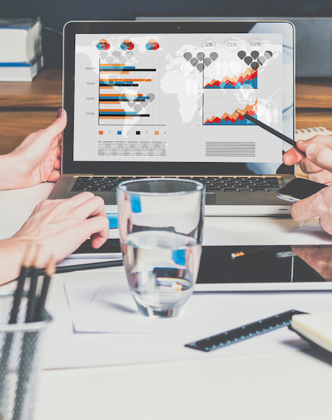 B2B online marketing professionals reviewing digital marketing data in a meeting