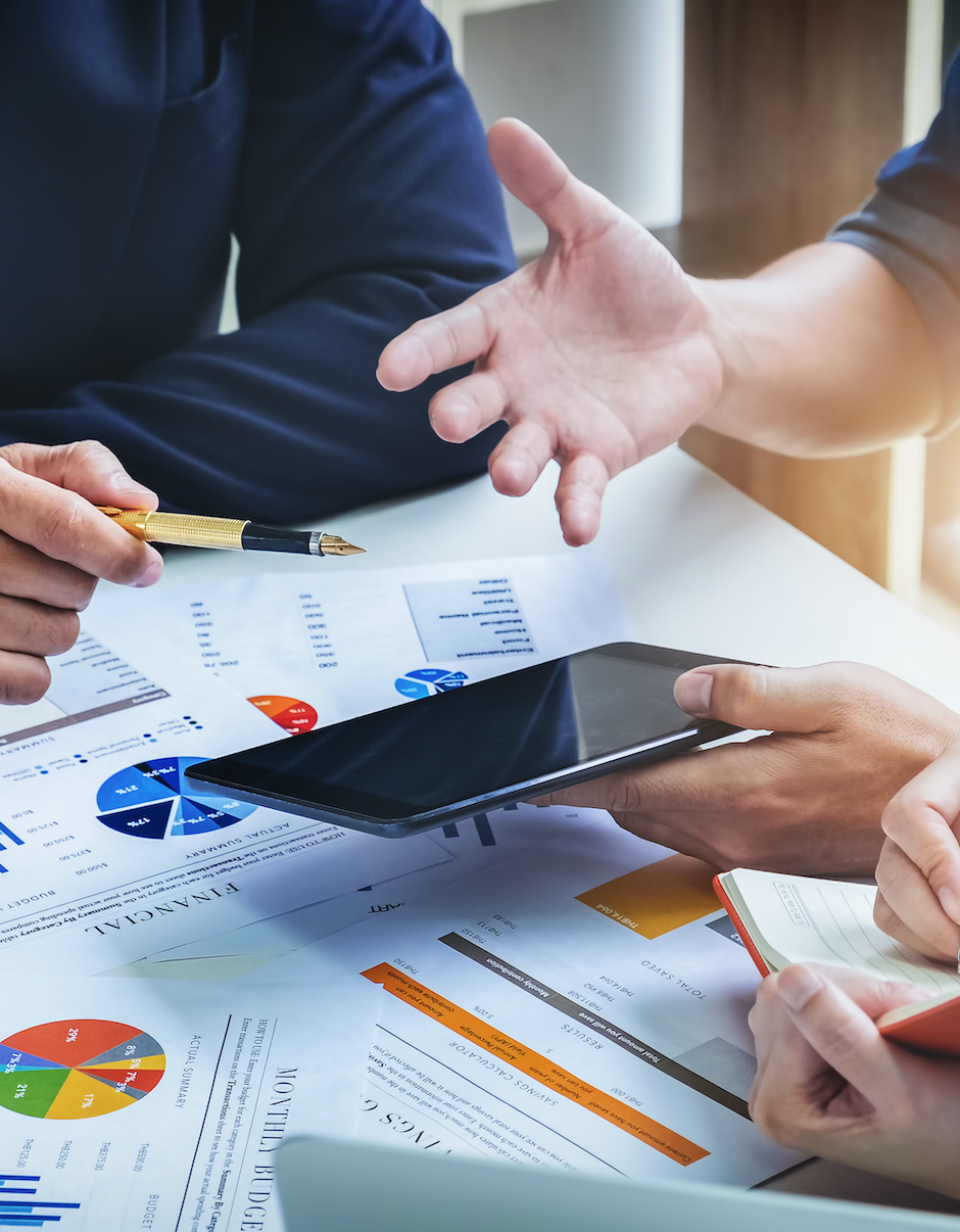 Digital marketing professionals discussing a custom lead generation plan